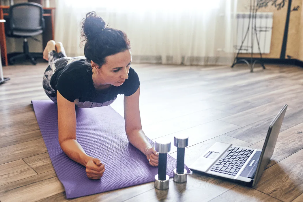 Personal trainer coaching a client during an in-home workout in Markham